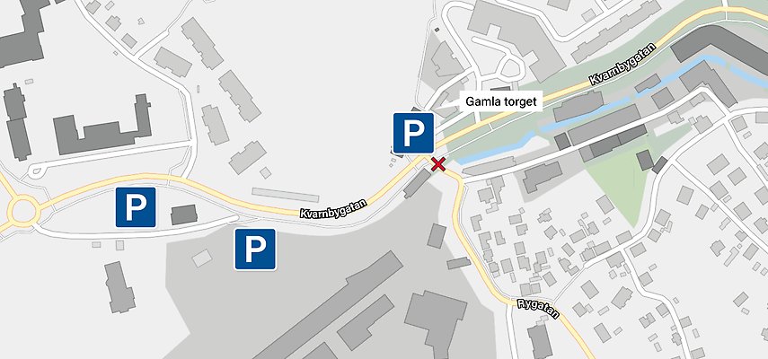 En karta som visar Kvarnbygatan. Tre ytor är markerade en en blå Parkeringsskylt för att visa var parkeringar finns.